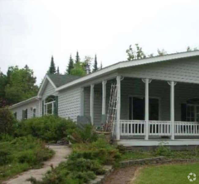 Building Photo - 8677 W Lake Rd Rental