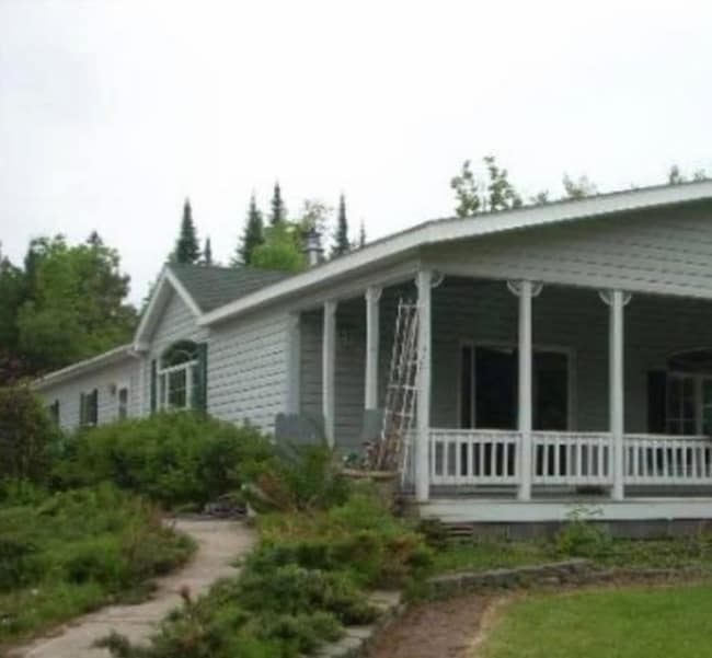 Building Photo - 8677 W Lake Rd Rental