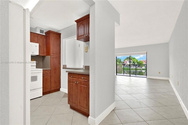Photo - 1335 W 68th St Unit 207