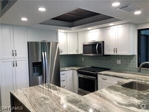 Building Photo - 5565 Trailwinds Dr Unit 213 Rental