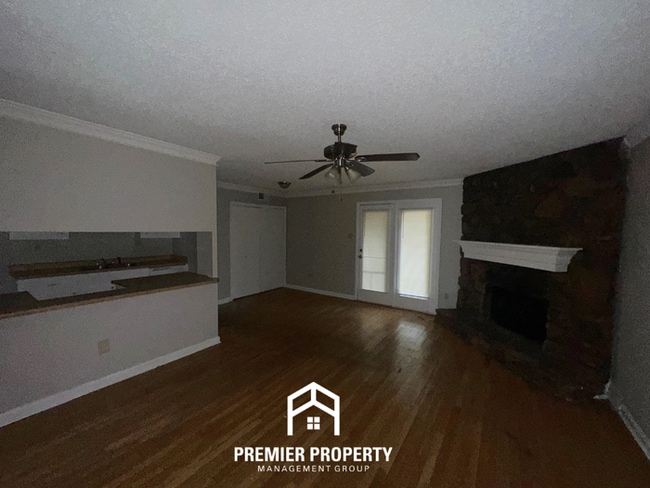 Photo - 3BR/2BA Memphis Rental with 1-Car Garage, Brick Fireplace & Spacious Fenced Yard