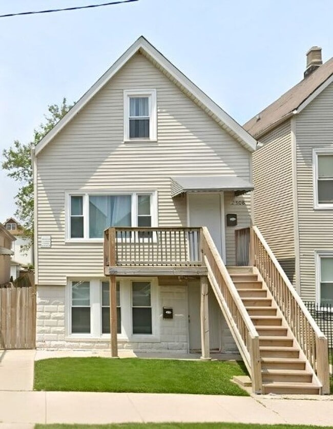 Building Photo - 2308 N Mango Ave Unit 2