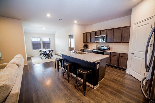 Photo - Boasts 4 bedrooms with 2 baths on a premier lot. As you enter the home, you will be greeted with ...