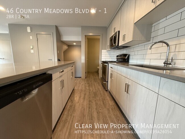 Photo - ?? Stunning 2-Bedroom Townhouse with 4 Bathrooms and Modern Design! Unité 1