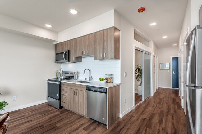 Kitchen and Hallway - Marquee Apartments