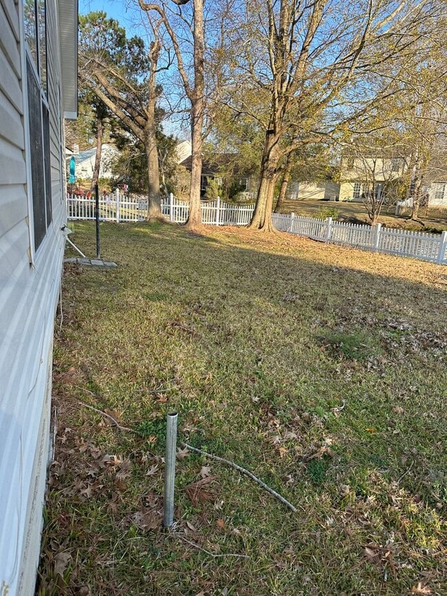 Photo - 3 x 2 with garage and pond view