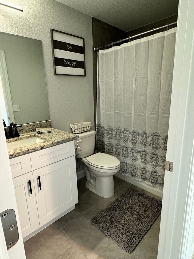 Photo - Stunning Brand-New 3BR/2BA Bushnell Block ...