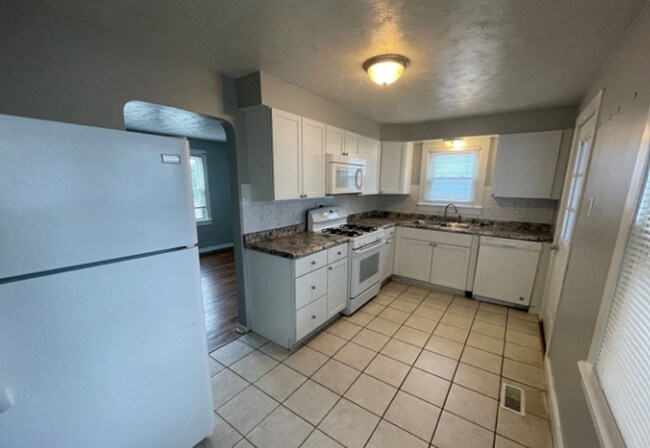 Photo - Charming 2BR Home with 1-Car Attached Garage, Hardwood Floor, and Washer/Dryer Provided!