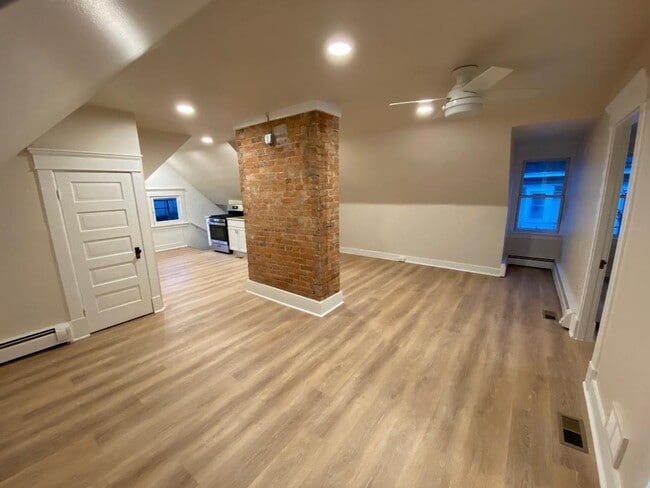 Large living - dining room with ceiling fan - 769 Delta Ave Unit 769