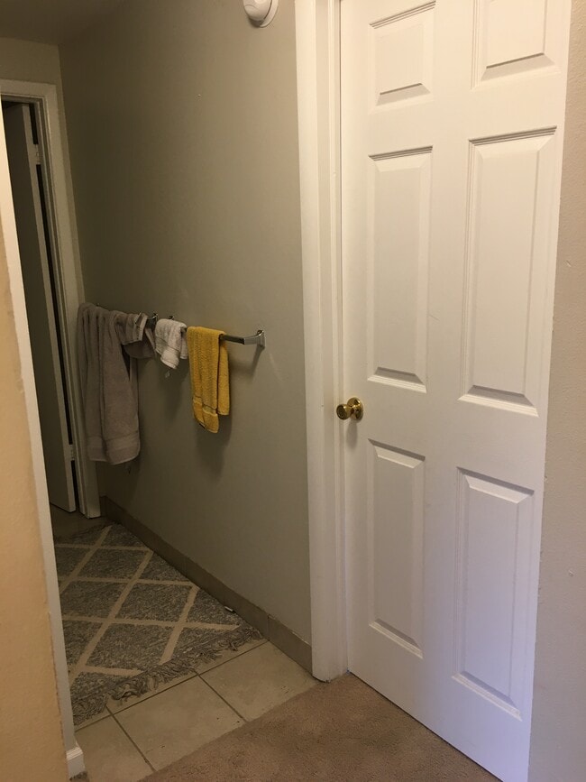 Upstairs bathroom on left, Bedroom 1 door - 3000 Colorado Ave Unidad G125