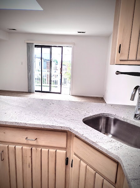 Kitchen Opens into Great Room - 1307 N Clayton St Unit Penthouse