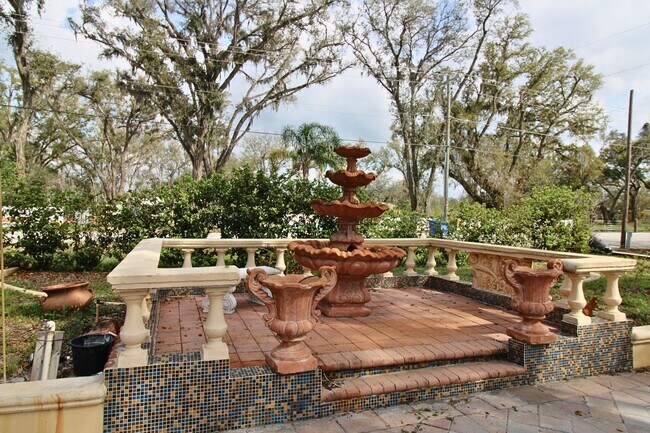 Photo - Stunning 3-Bed, 2-Bath Spanish-Inspired Custom Home with Elegant Gardens & Fountains