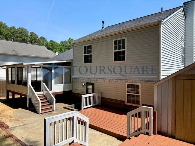 Photo - Spacious 4-Bed / 3-Bath Single-Family Home with Sunroom, Fenced Yard. Convenient to Southeast Ral...