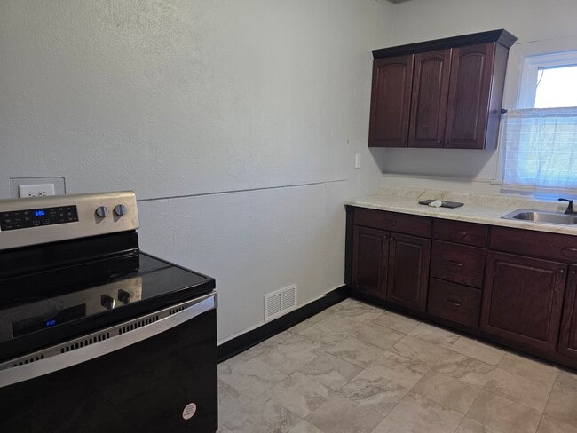 Photo - 3-Bedroom, 1-Bathroom Home with Basement – $1,215/Month - Accepting Section 8