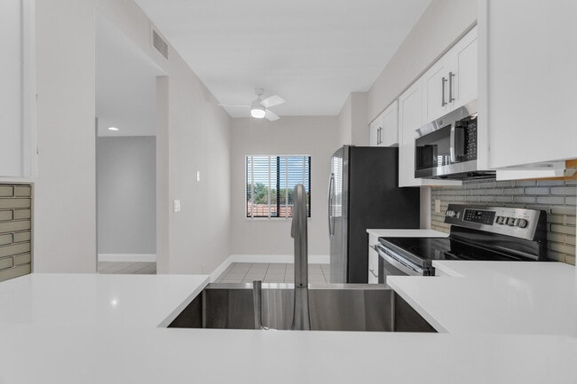 Building Photo - 6241 Pointe Regal Cir Unit 402