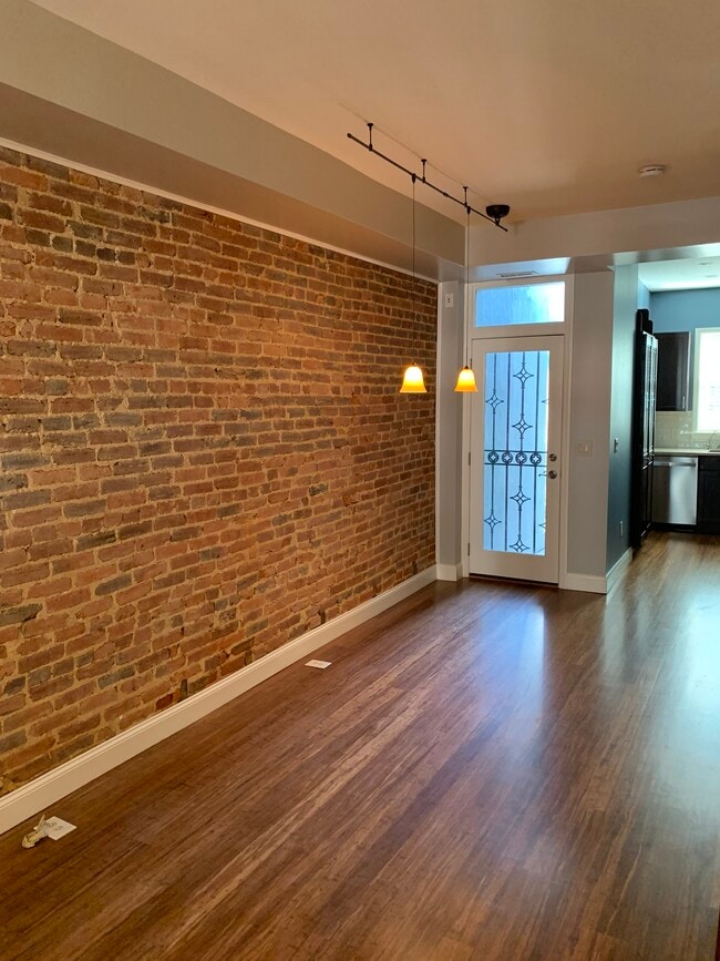 Open-concept living and dining. - 2241 12th Plz NW