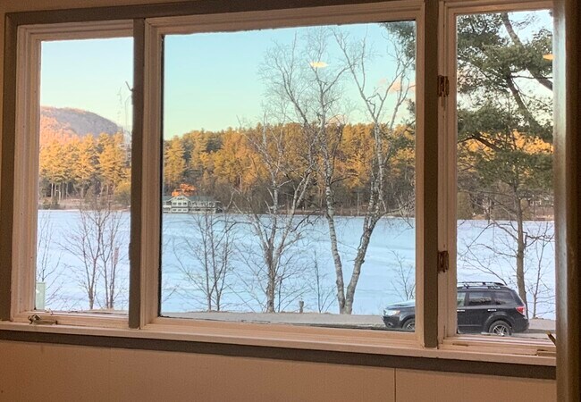 View of Mirror lake! (Taken upstairs & current listing is downstairs, but same view, basically.) - 26 Parkside Dr Unit 101