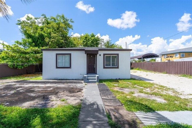 Building Photo - 2960 NW 63rd St Unit 1 Rental