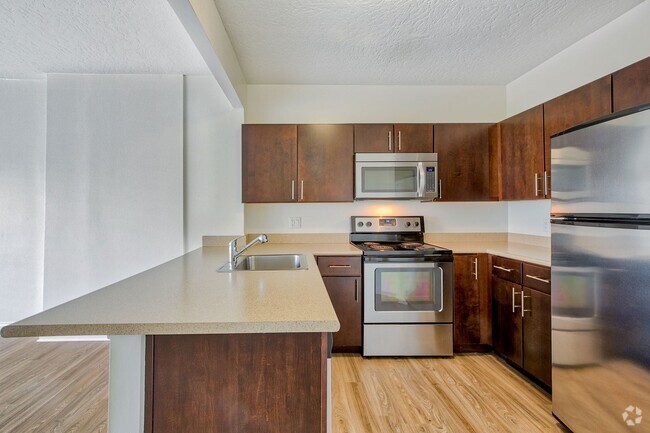 Kitchens are complete with stainless steel appliances - Renaissance Tower Rental