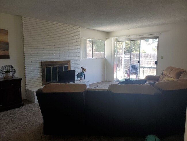 Photo - Single-story home with a private pool in the SDSU.