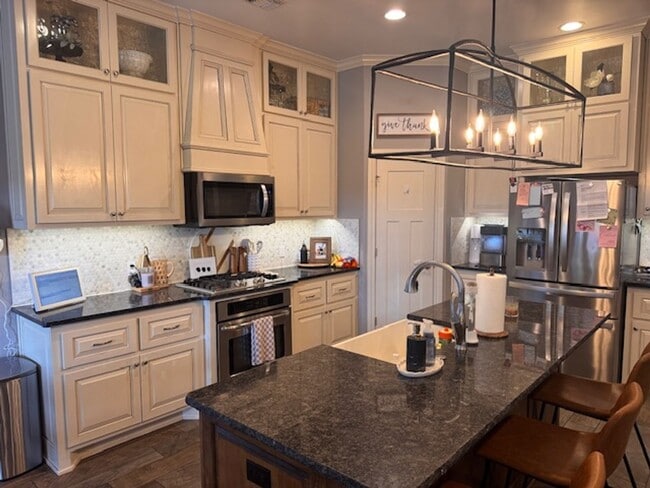 Photo - WOW! This home has it all, 3 full bathrooms, 5 true bedrooms AND a bonus room. great outdoor spac...