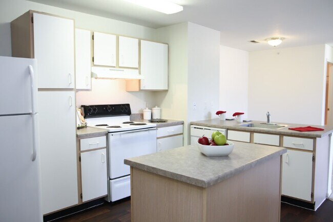 Spacious kitchen with island and plenty of cabinet space