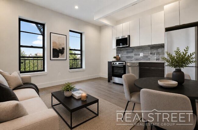 Photo - Spacious 2BR w/ Laundry, Pets OK, Backyard & Lounge | Steps to Brower Park & 3/4/C Trains Unidad 3B
