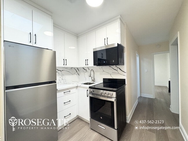 Photo - Cozy 2-Bedroom Apartment with Private Outdoor Space in Etobicoke Unit 2