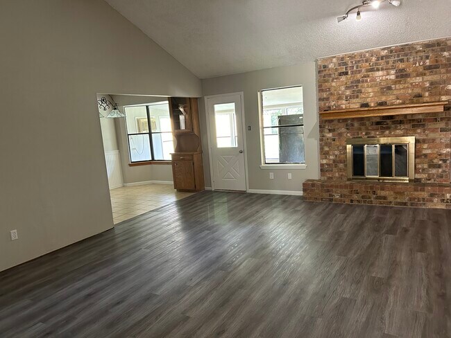 Large fireplace, open living room