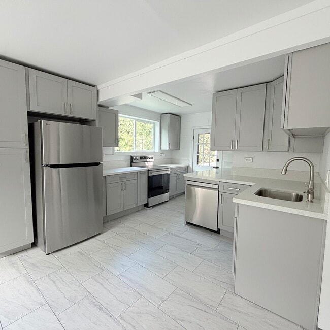 Brand new full size kitchen with all stainless steel appliances including dishwasher! - 1739 Kamohoalii St