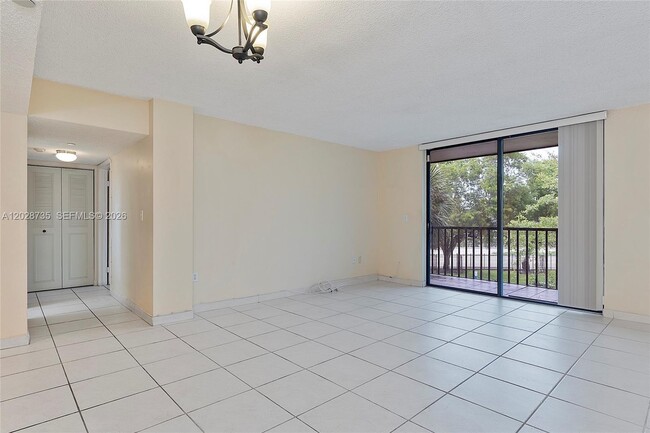 Building Photo - 8760 SW 133rd Avenue Rd Unit 301