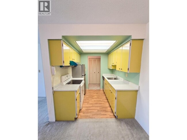 Photo - 6560 Buswell St Unit 206