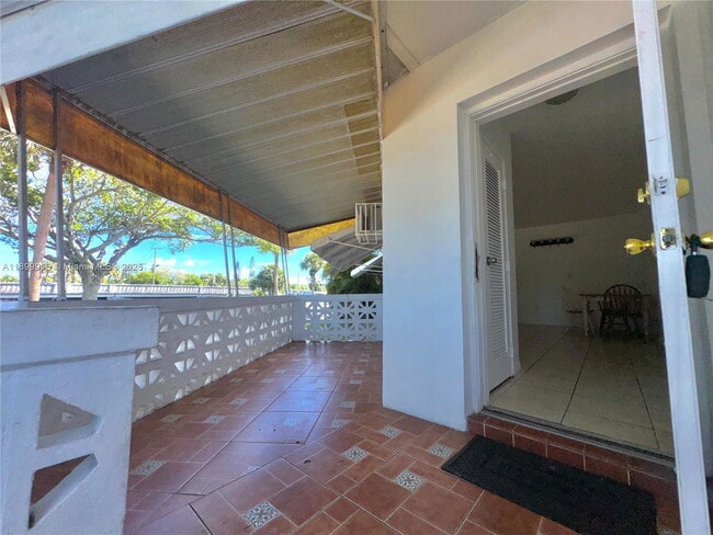 Building Photo - 1450 NE 171 St Unit 101B