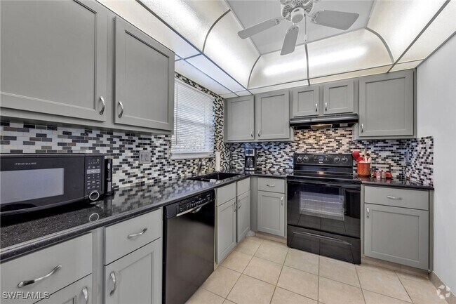 Building Photo - 12250 Tamiami Trl E Unit 1402 Rental