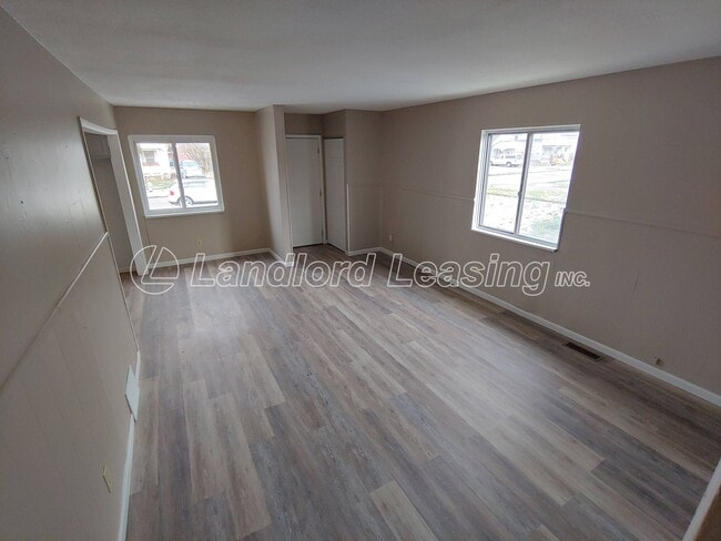 Photo - Freshly painted 3 bedroom with new flooring throughout!