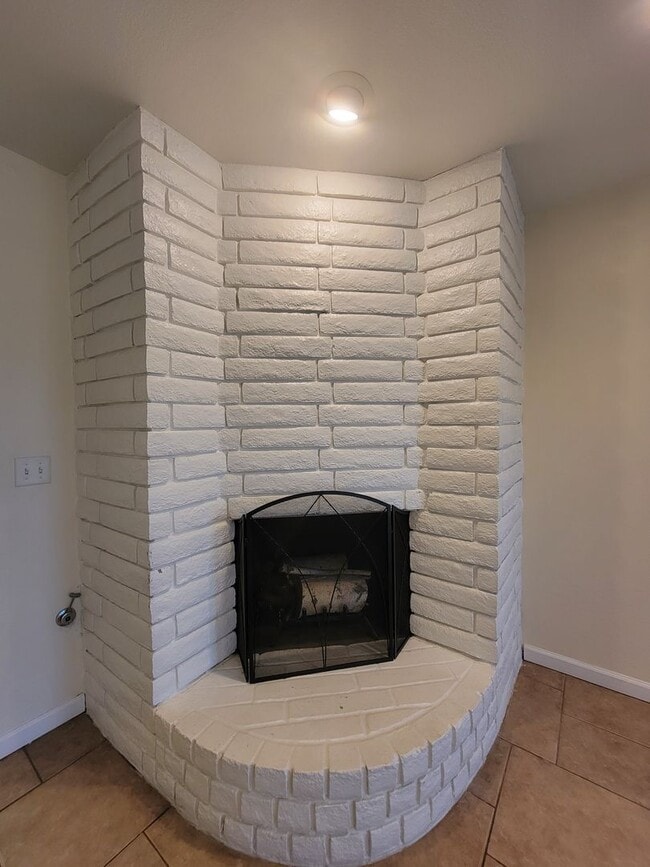 Photo - Condo with open floor plan and a two-car g...