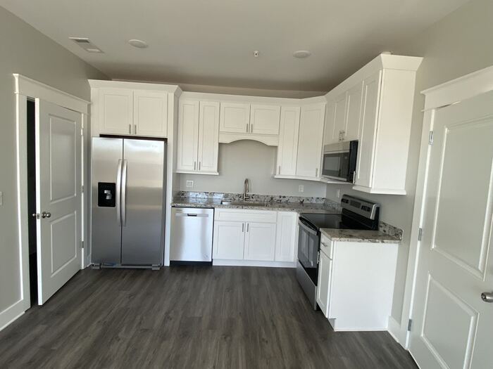 NEW CONSTRUCTION CONDO - NEW CONSTRUCTION CONDO