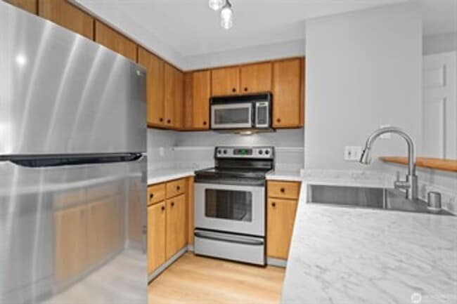 Photo - Modern 1-Bedroom Condo in Vibrant Greenwood Neighborhood Unit 214
