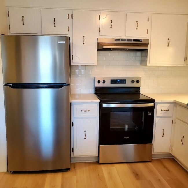 Kitchen with new backsplash - 49 Spencer Rd Unit H 30