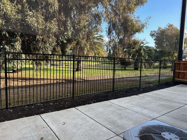 Photo - "Charming 3-Bed, 3-Bath Home right on the golf course - 1370 Sq Ft of Cozy Living!"