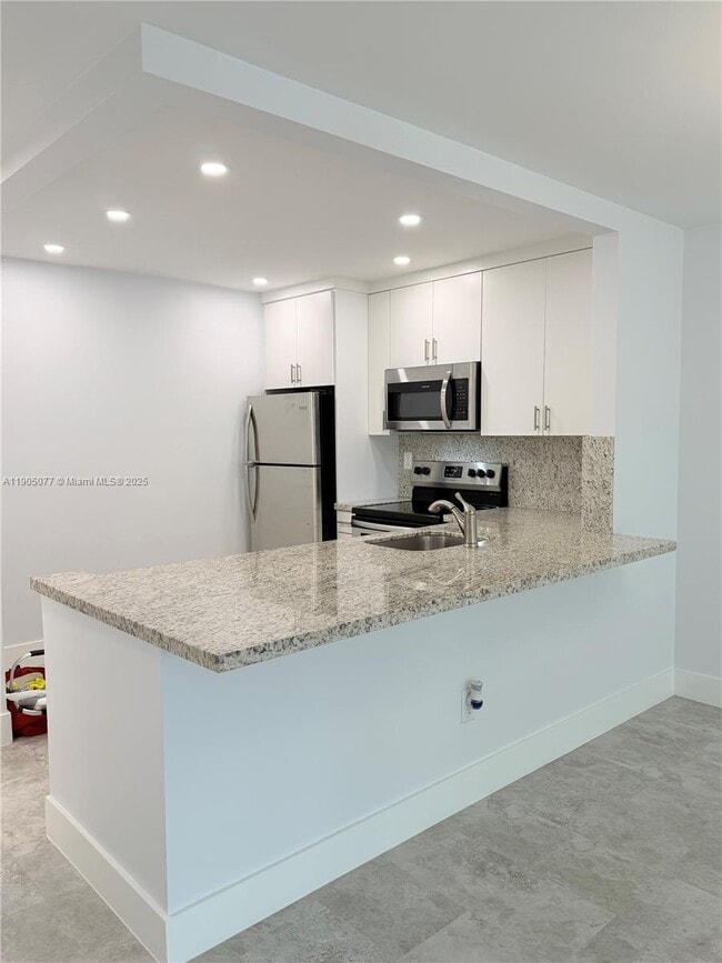 Building Photo - 7840 Camino Real Unit P-312