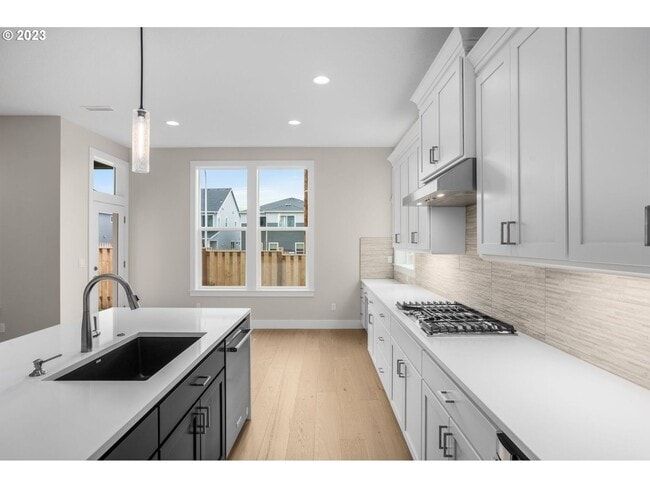 Photo - Beautiful 4 Bedroom + Office Home with Open Layout, Gourmet Kitchen & Large Entertainment Room