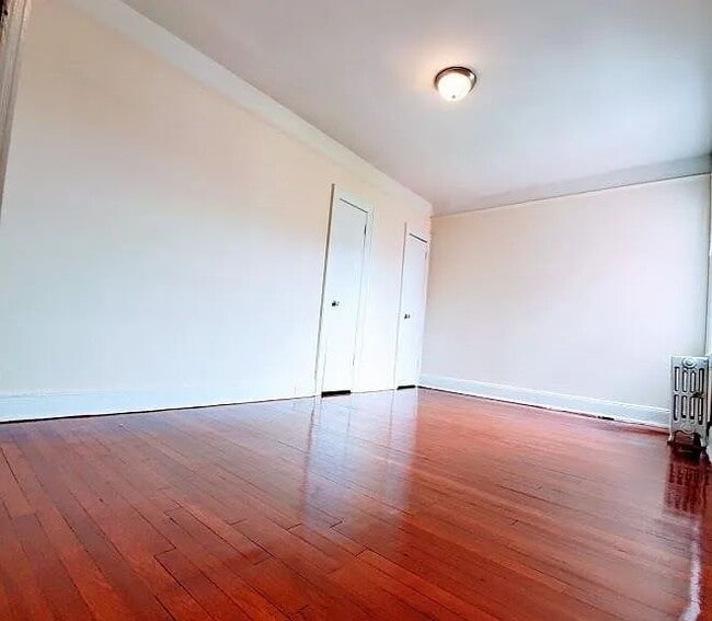 Photo - "Charming 1-Bed Oasis in the Heart of Woodside, NY!"