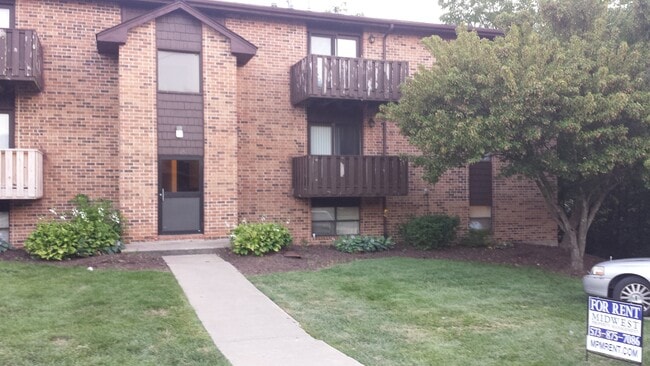 Building Photo - 2 bd,1 ba top level Smithton condo, w/d, deck overlooking trees by Broadway and Hwy 63