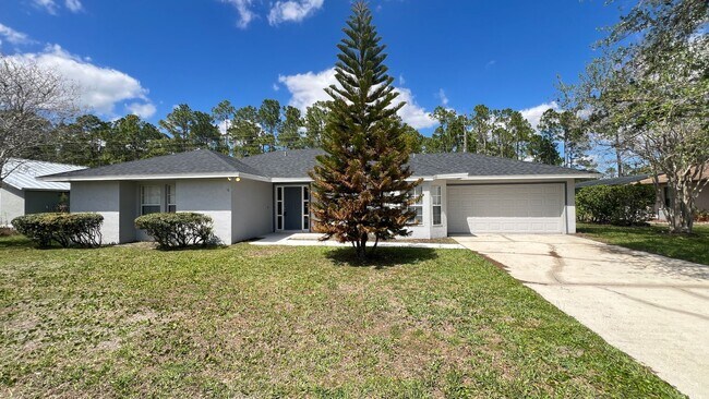 Building Photo - Bright & Spacious 3/2 Home with Huge Yard + Screened Patio — Lawn Care Included!