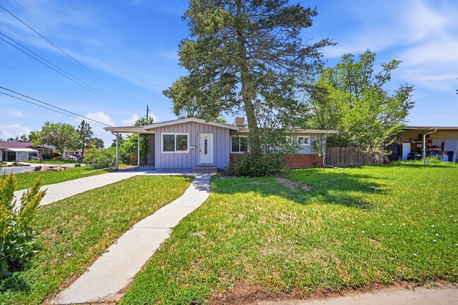 Photo - $2,640.95- 4 Bed, 2 Bath Home in Denver with Patio Space and In Unit Laundry!