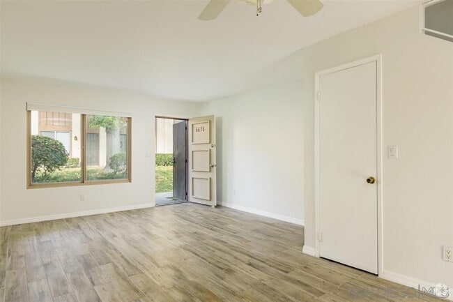 Building Photo - 6656 Bell Bluff Ave Unit 0 Rental