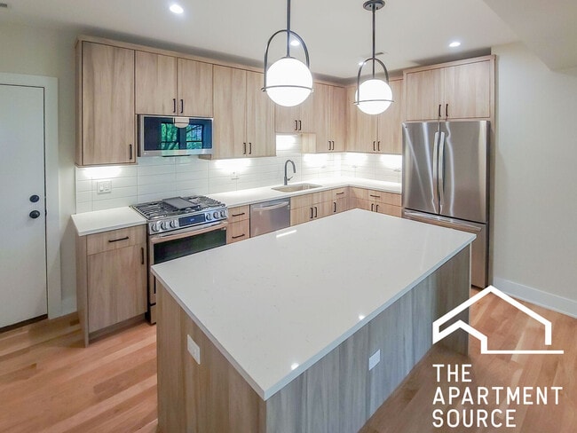 Building Photo - 4853 N Seeley Ave Unit 2