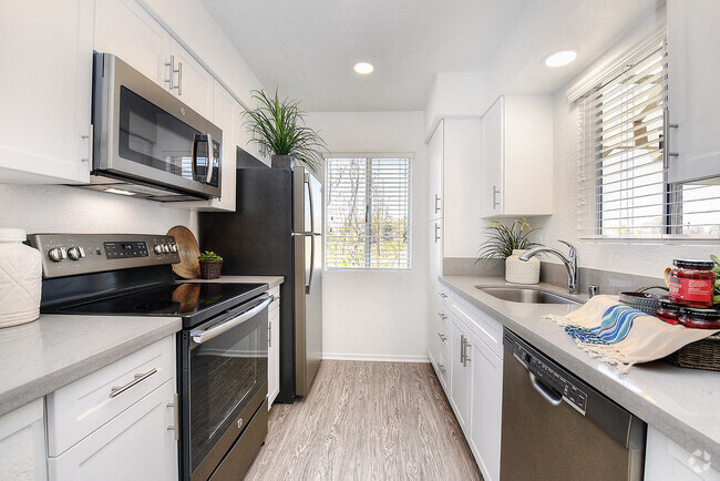 1 Bedroom-Plan B-Beautifully Upgraded Kitchen with Quartz Counters, New Appliances, New Cabinets and Much More! - Bella Vista Rental