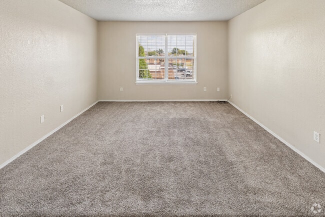 2BR, 1.5BA - 829SF - Living Room - Pine Terrace